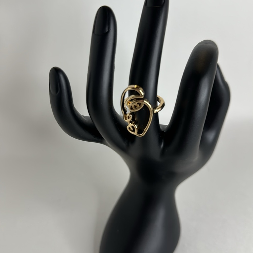 Shape of a Face Band Ring